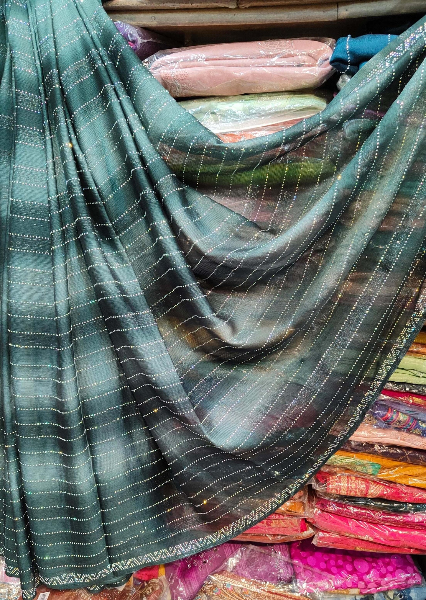 Shimmering Rimzim Saree with Rainbow Stone Work & Designer Blouse